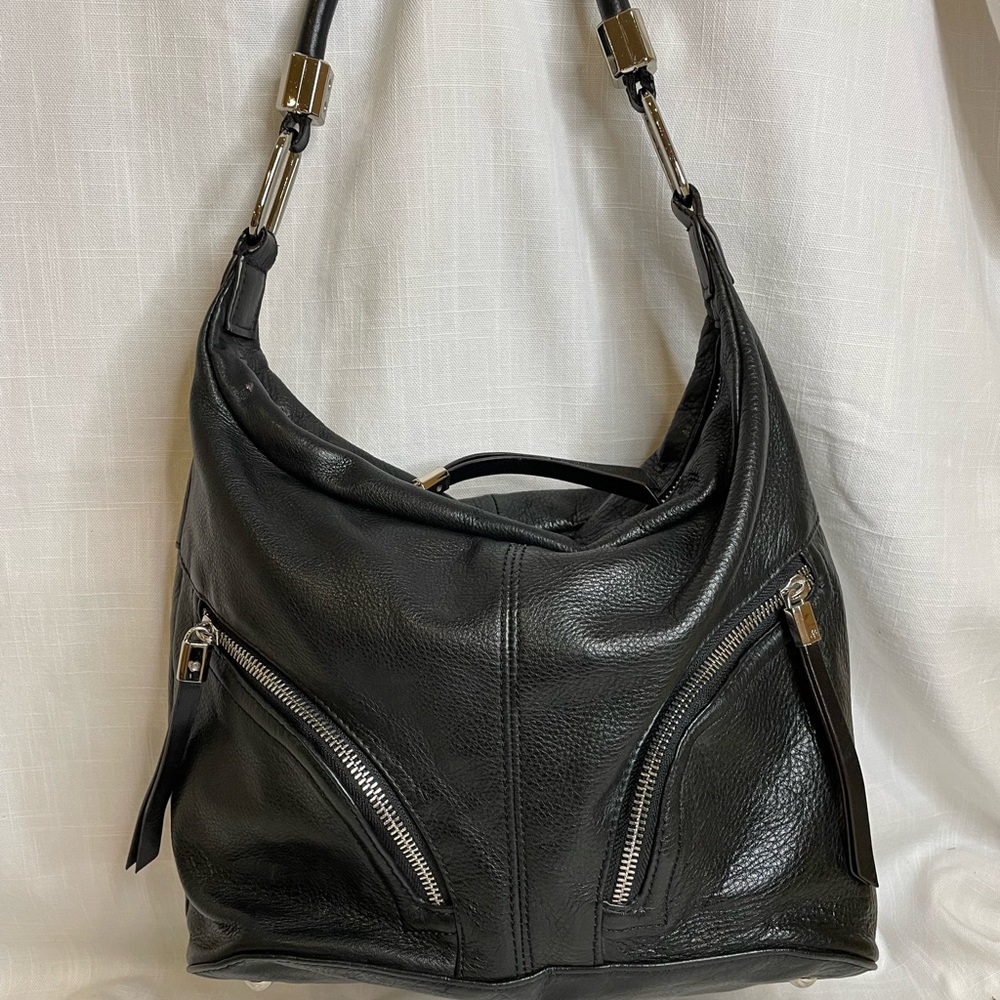 Black leather shoulder bag. b. makowsky